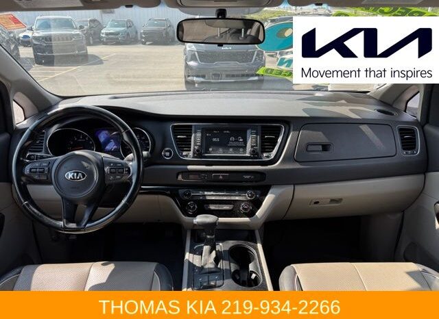 
								Kia Sedona full									