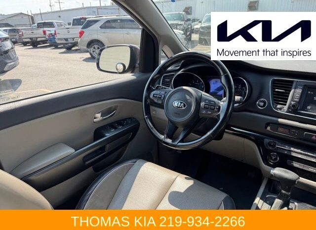 
								Kia Sedona full									